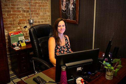 Rachel at her desk handling customer service accounts
